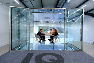 floating glass meeting room in glazing showroom